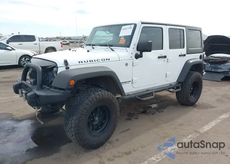 2014 Jeep Wrangler Unlimited Rubicon из США, поврежденный, VIN 1C4HJWFG1EL210412
